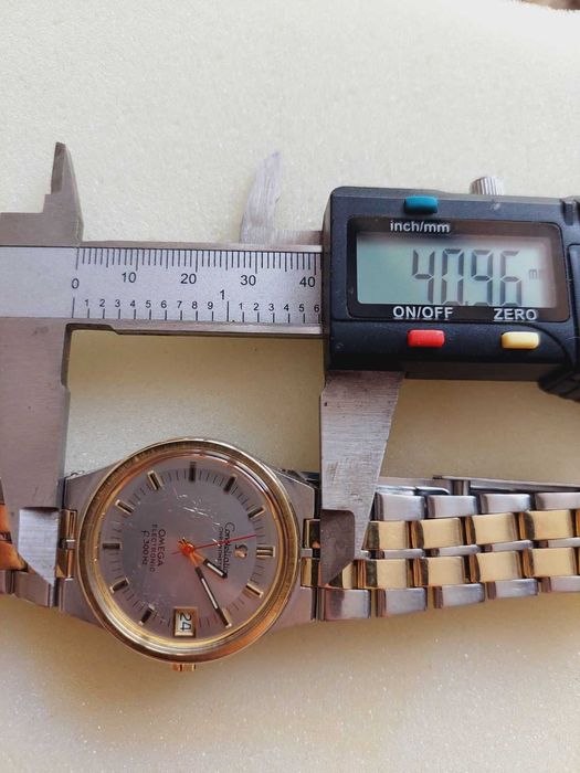 Омега,Omega Constellation,злато-стомана-електромеханичен часовник 70г.