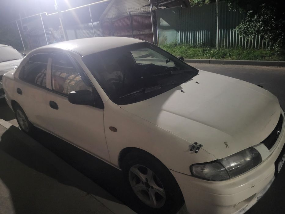 Мазда 323 Фамила