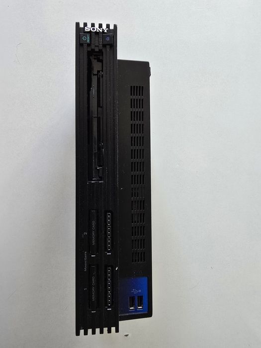 Playstation 2 modat cu cip ruleaza si  jocuri Playstation1