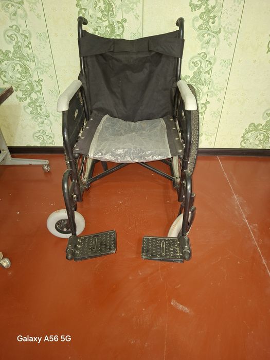 Инвалидная коляска