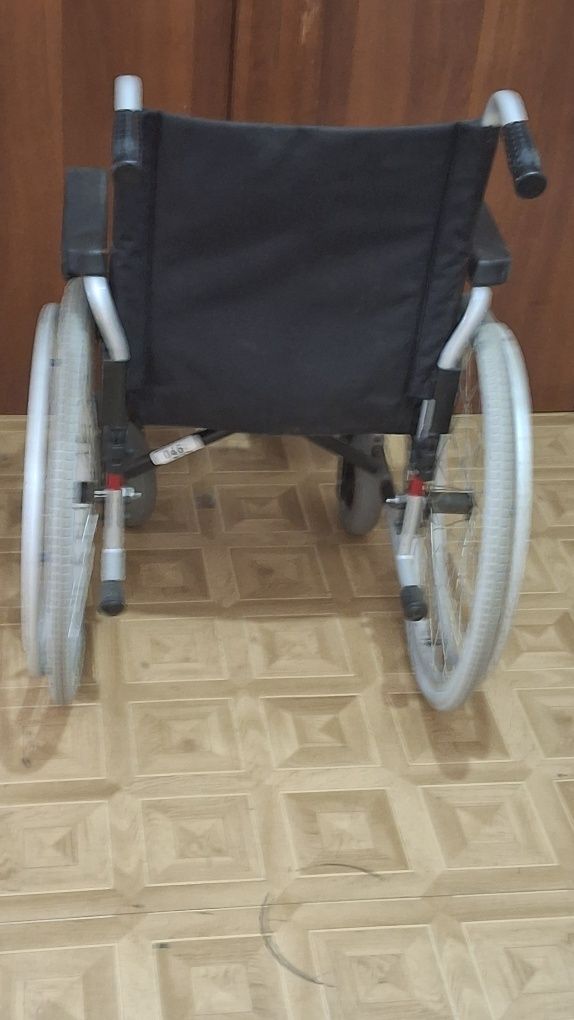 Инвалидная коляска