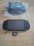 PSP Sony 3004 modat cu adaptor și card Sandisk Extreme 32gb impecabil