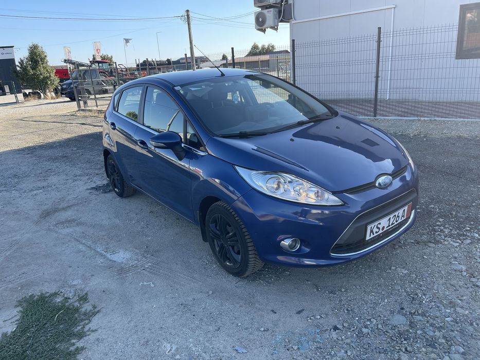 Ocazie! Ford Fiesta ghia, 1.25 mpi,navigatie,klima,proiectoare cata