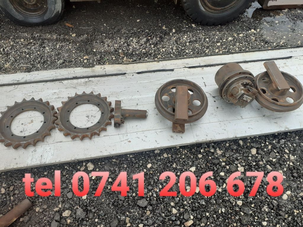 Hidromotor,sprochet,rola intinzatoare,rola de ghidaj, piese cat 302.5