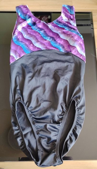 Трика за спортна гимнастика с къс или без ръкав