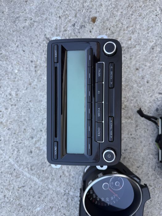 Ceasuri bord (benzina )comanda clima / casetofon radio Vw Golf 6