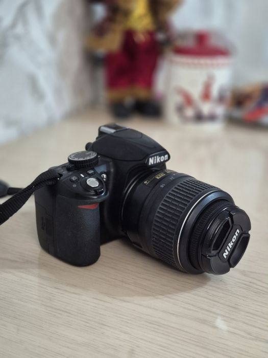Продам зеркальный фотоаппарат Nikon 3100 в отличном состоянии.