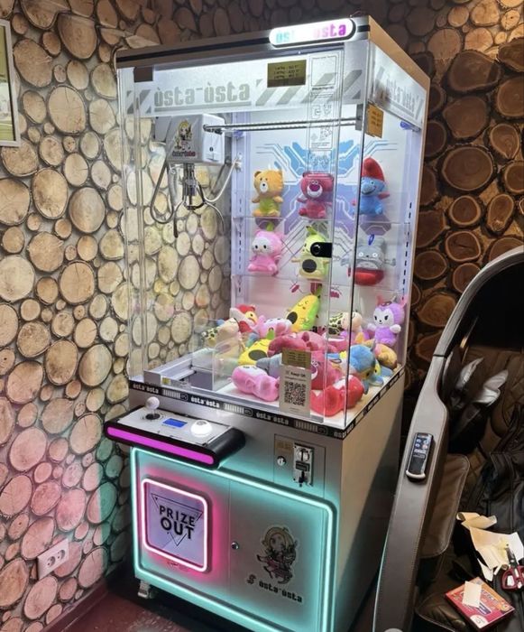 Игровой аппарат хватайка