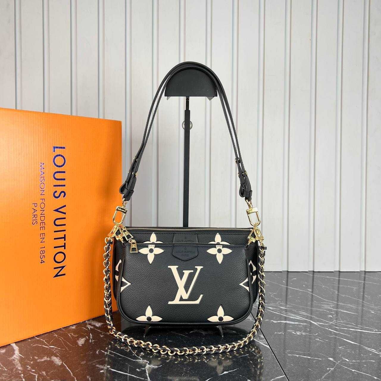 Louis Vuitton genti din piele naturala