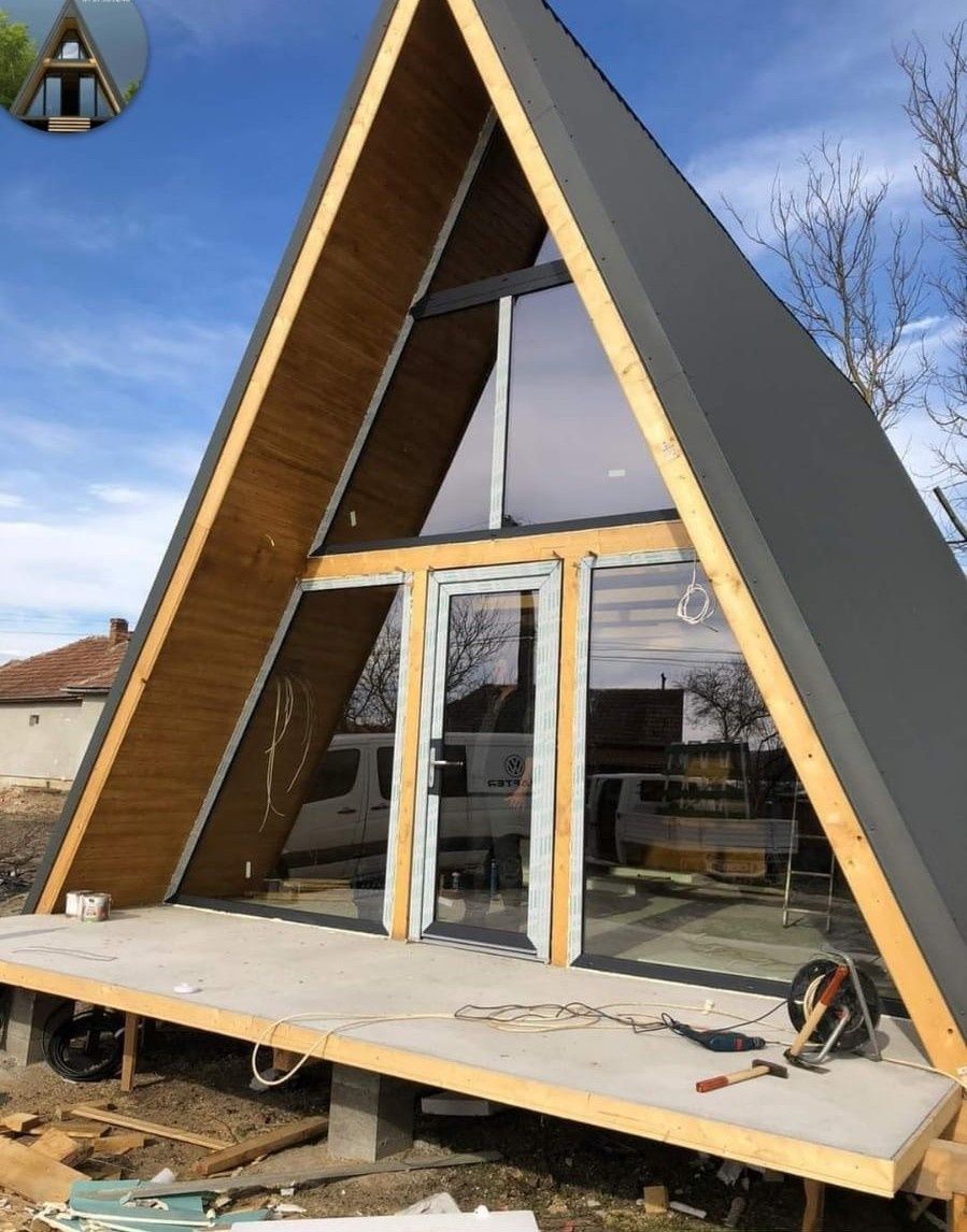 Case și cabane pe structură de lemn