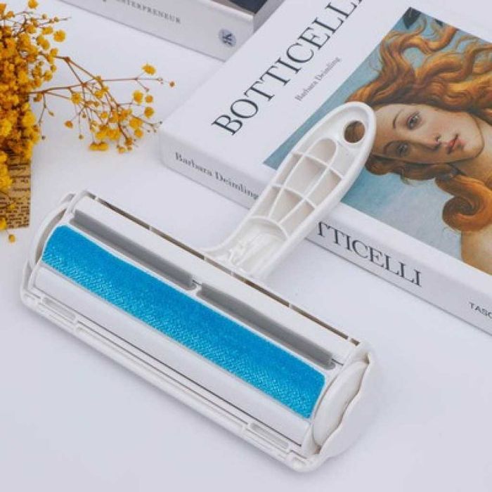 Четка за премахване на косми от домашни любимци