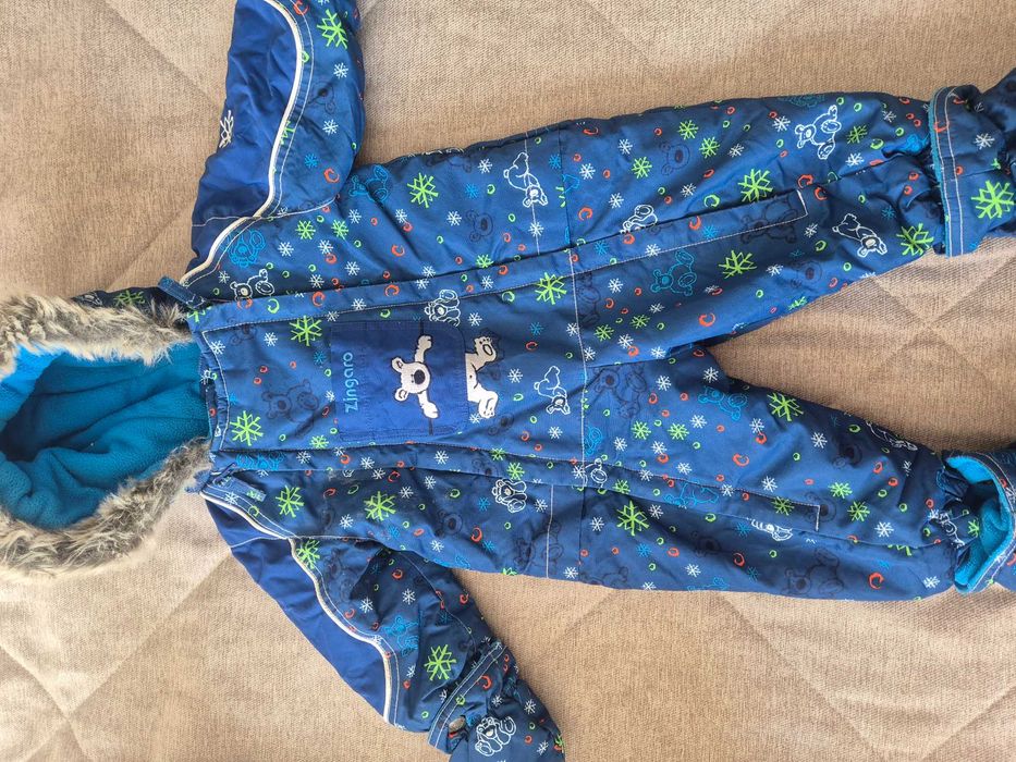 Продам зимний комбинезон Gusti