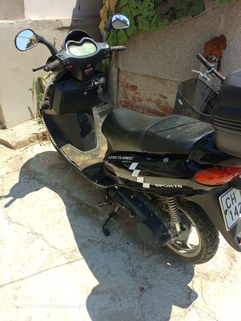 Скутер 125кубика