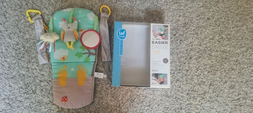 Jucarie interactiva  bebe Taf Toys pentru mersul in masina