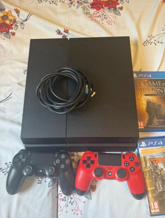 Playstation 4 + 10 jocuri + manete