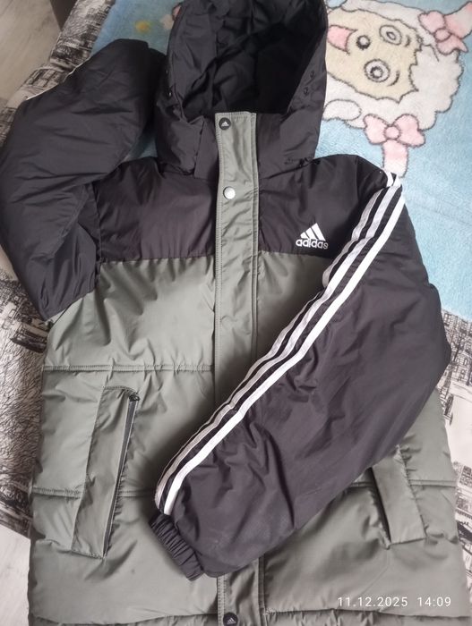 Продам новую зимнюю куртку -пуховик