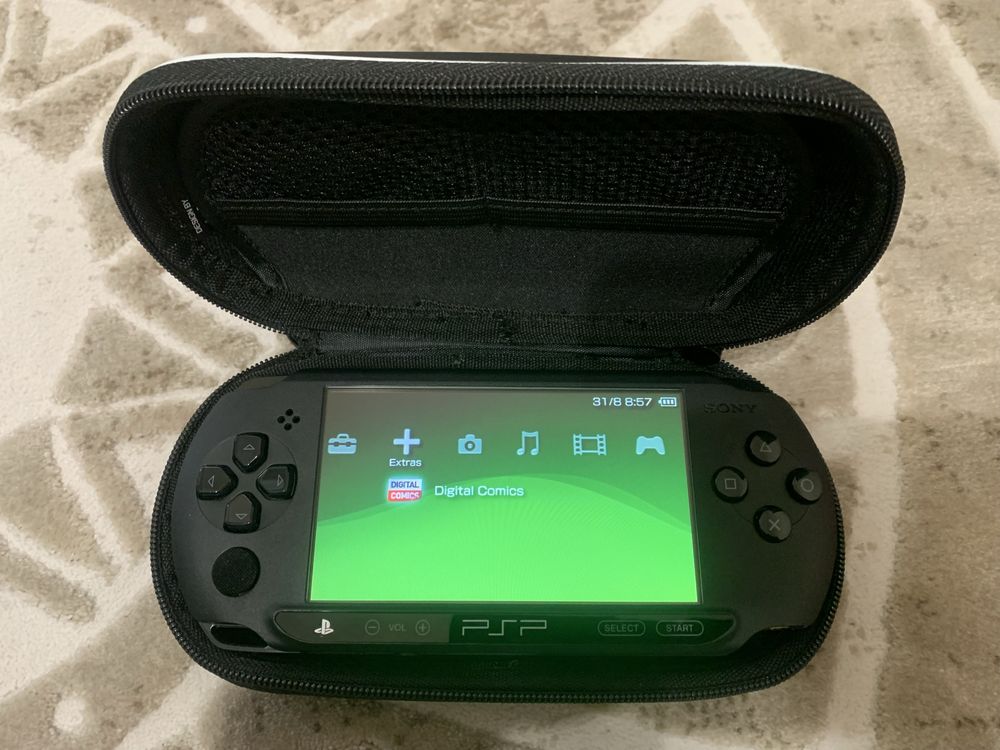 Sony PSP Street (PSP-E1000) portable game console in its carrying case
