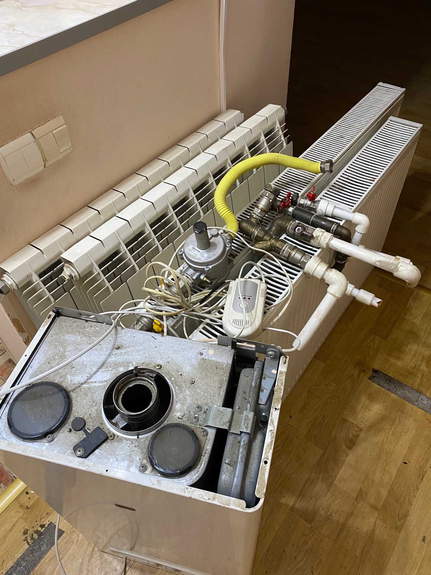 Centrala termica 24 kw, calorifere aluminiu și oțel