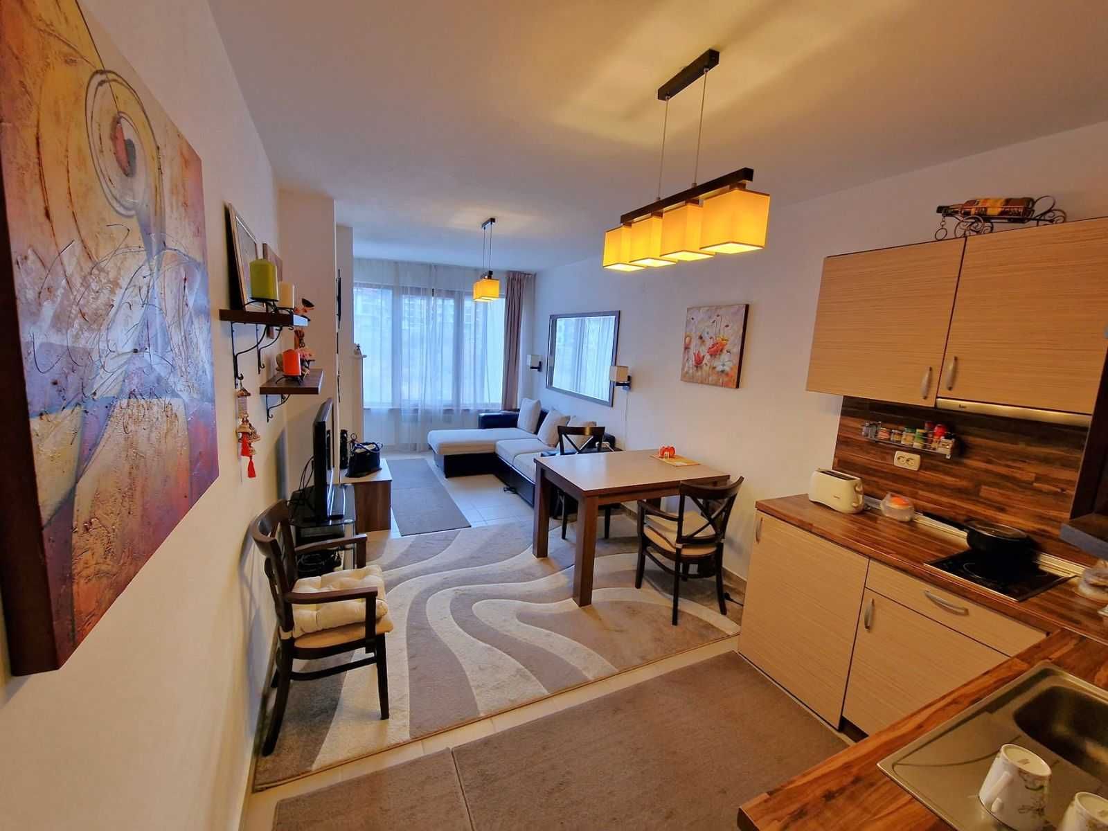 Обзаведен двустаен апартамент с подземен гараж за продажба в Банско
