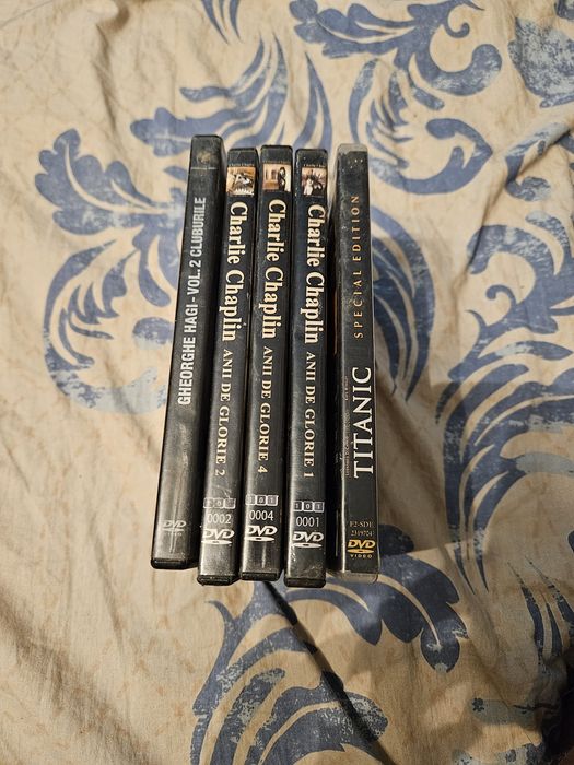 Vand discuri DVD pc sau laptop titanic hagi si Chaplin