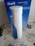 Irigator bucal ORAL-B Aquacare 4, 2 viteze, 2 capete, 150ml ca nou
