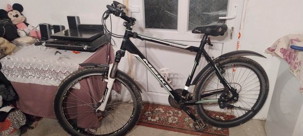 Bicicletă nouă,dau la schimb pe un telefon