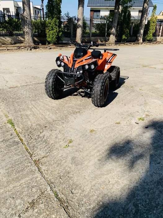 Vând atv 125 renegade