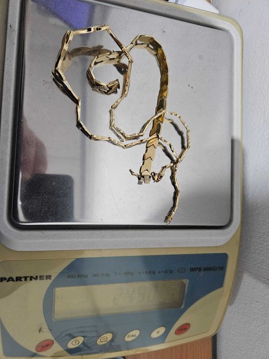 Aur Set Colier 14 K, 300 lei gramul.