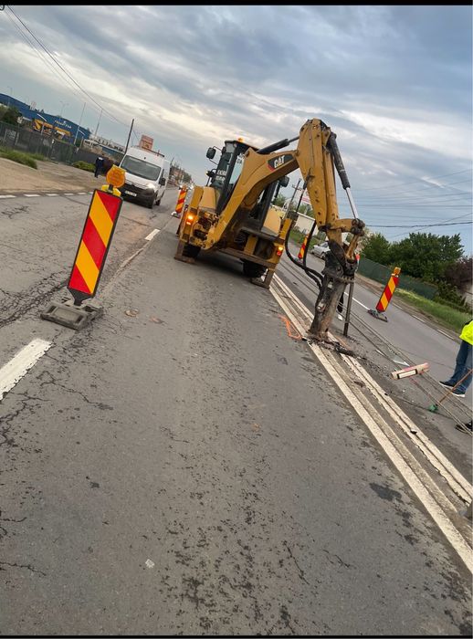 Inchiriem buldoexcavator