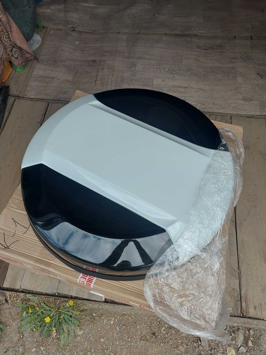 Чехол из пластика на запасное колесо новый