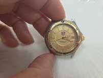 Ceas tag heuer(detin si catarama)are cadranul din auri