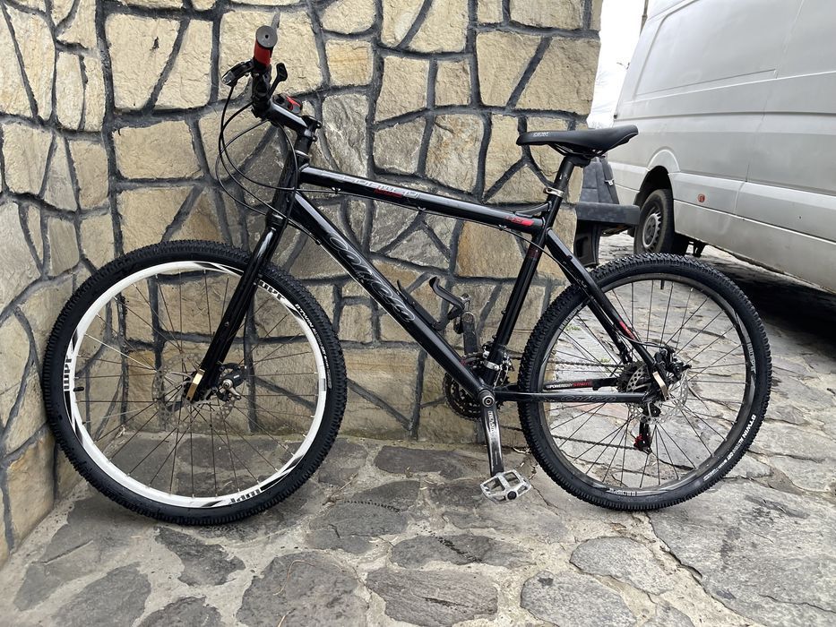 Bicicleta Carrera  cadru aluminiu frane pe disc roti 26”