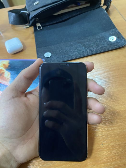 Iphone xs obmenga true tone bor face id ishlidi