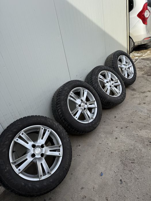 Vand set jante aliaj dacia 4x100 r 16 plus cauciucuri de iarna
