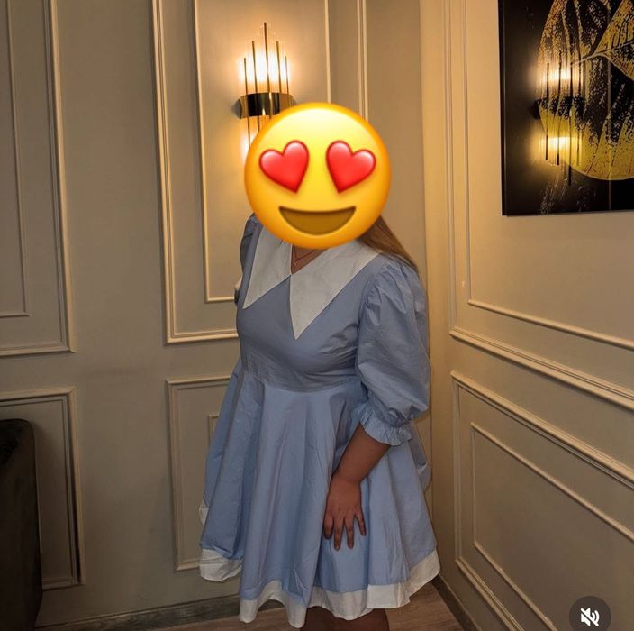 Жаңа көйлек этикеткасымен