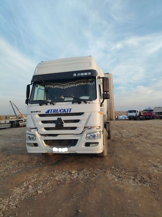 Howo sinotruk  2012 yil oq beliy metan bor