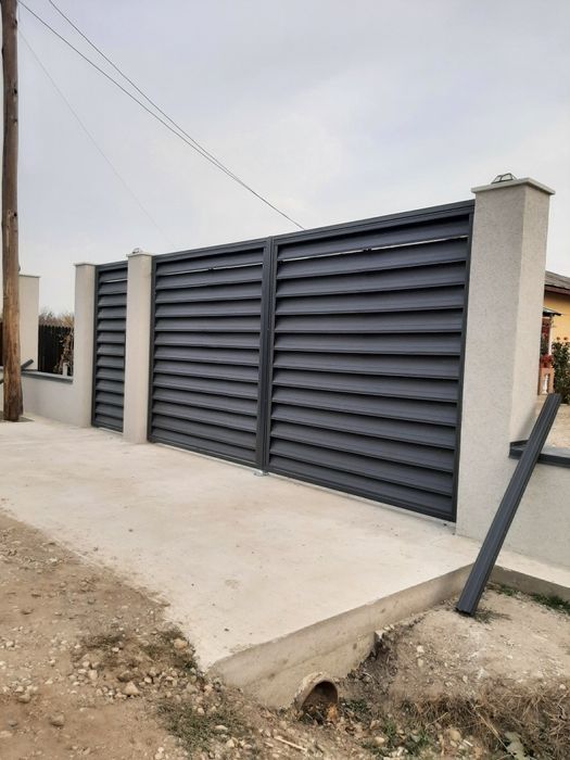 Vindem garduri tip jaluzea șipcă metalică si porti din fer forjat
_tab