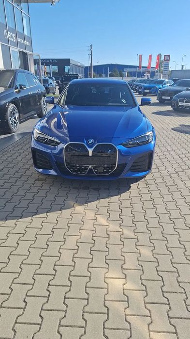 BMW i4 Autoturism BMW I4e35 Grand Coupe culoare albastru Portimao .