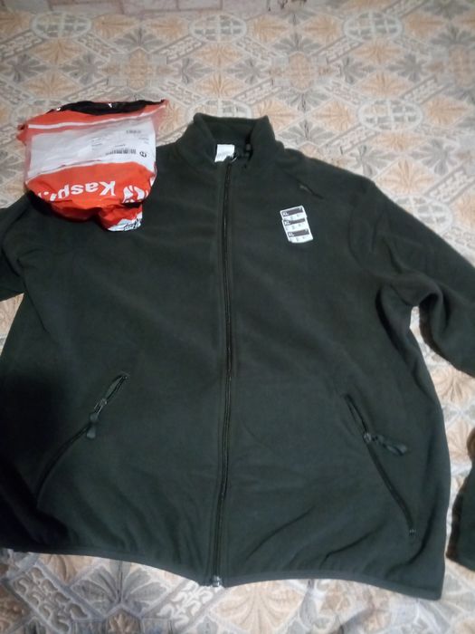 Продам олимпийку новую