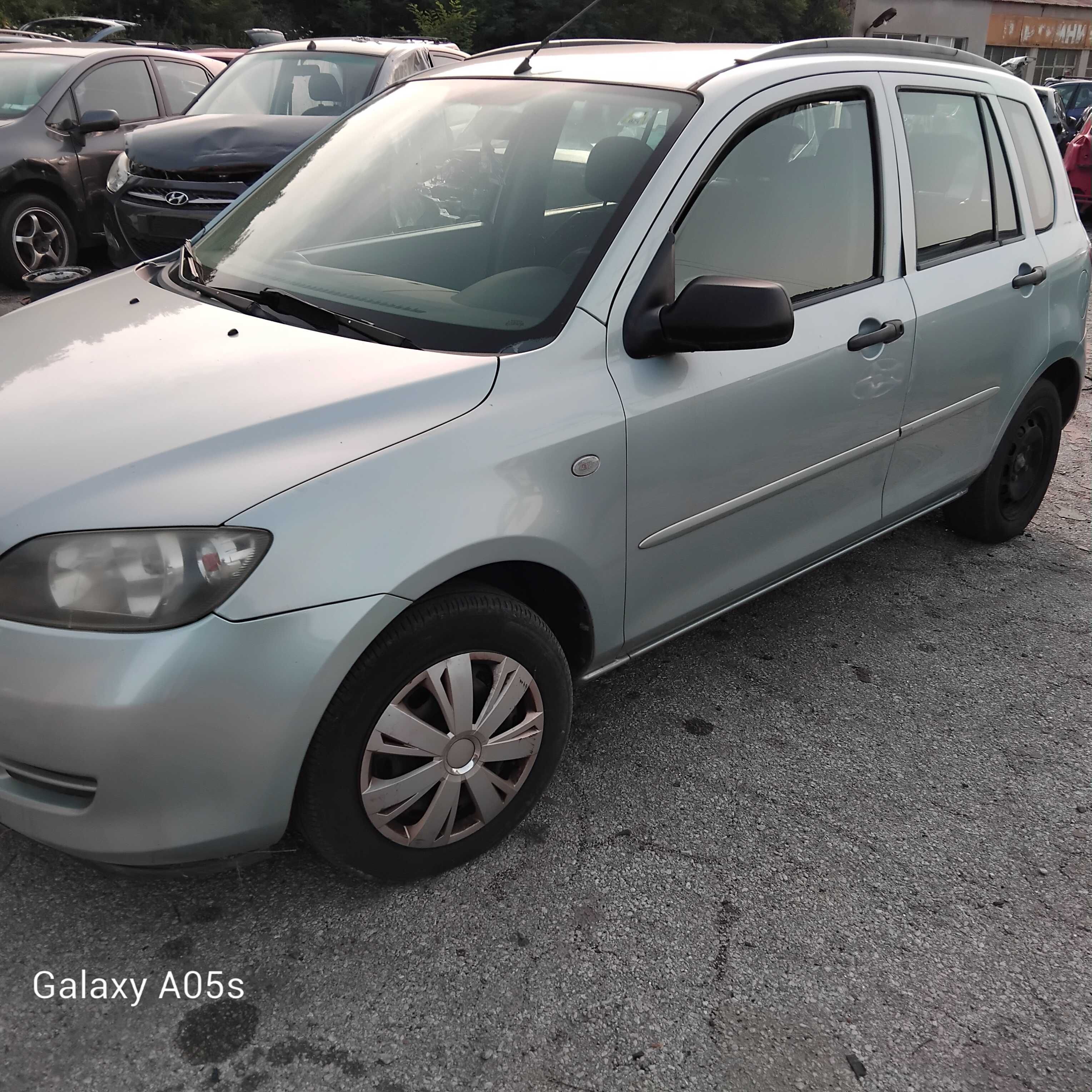 Mazda 2  1.2i 75 к.с. на части 2004г.