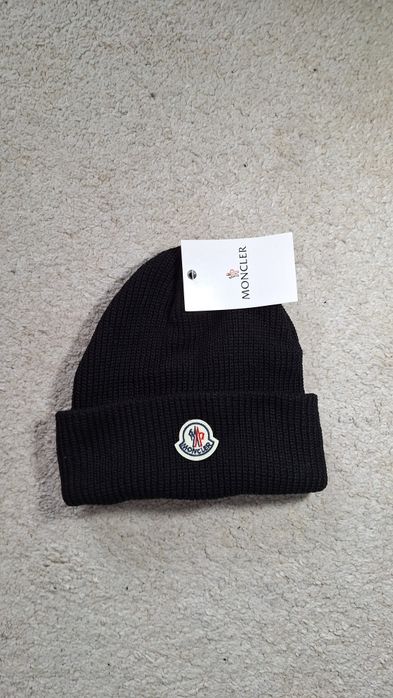 Caciula Mocler, Nou Cu Eticheta