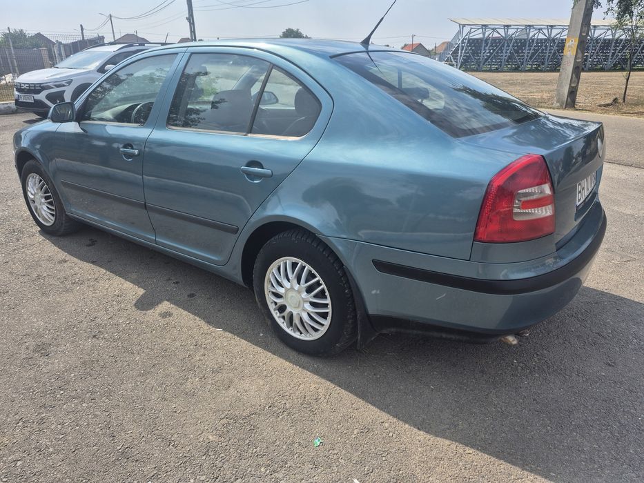 Skoda octavia 2  schimb cu Transporter T5
