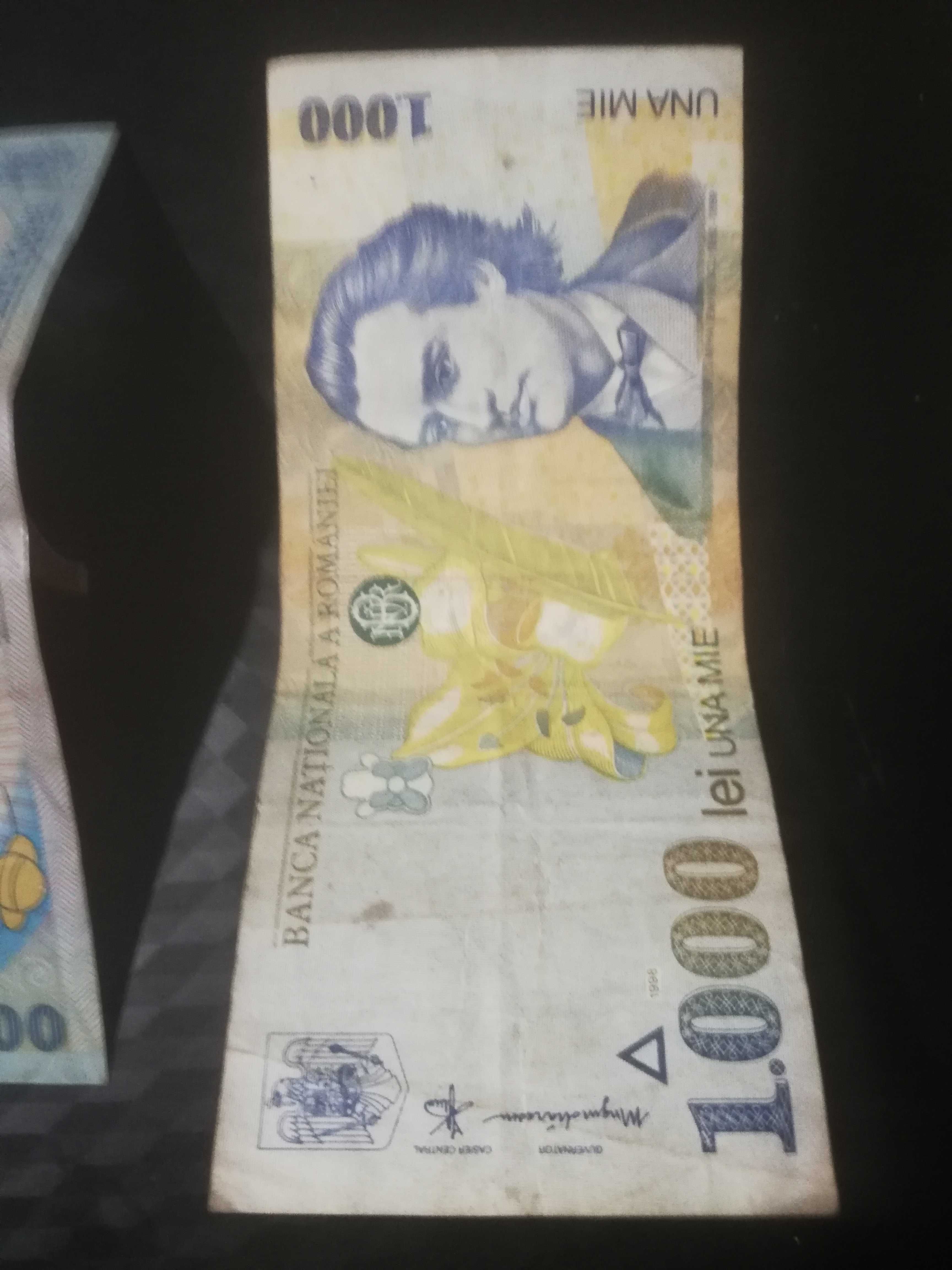 Bancnote eclipsa și bancnotă de 1000 Mihai eminescu