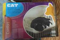 Кровать-лежанка для кошек у батареи