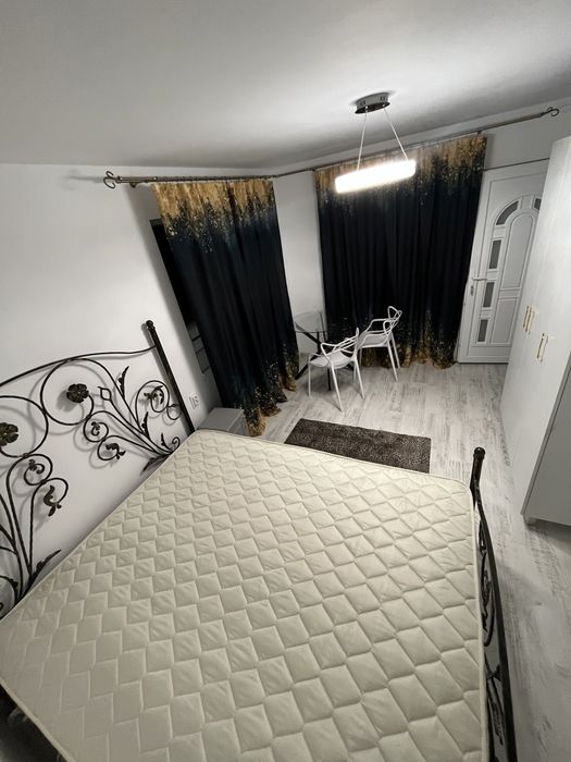 Chirie camera privata lux dar baia bucataria la comun centru tg cucu