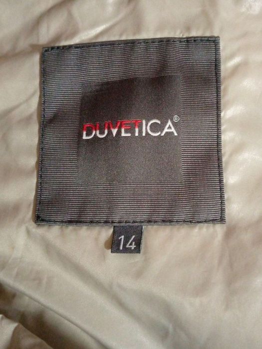 Тёплая куртка на девочку ( 14 лет)