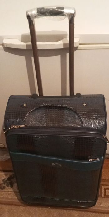 Продам чемодан новый  35к