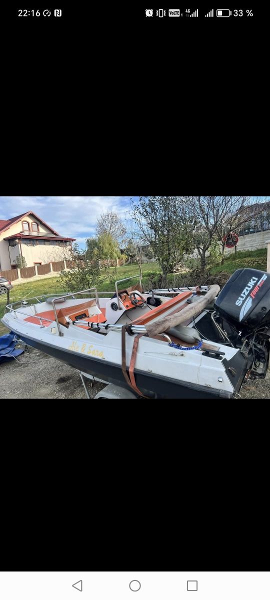 barca cu peridoc si  motor 70 cai  injecție