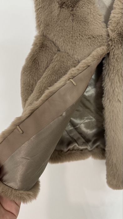 Vesta din blanita artificiala