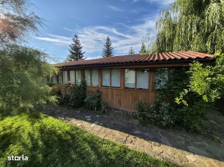 Cabana de lemn cu fundatie 86 mp+ livada pomi fructiferi+teren 847 mp